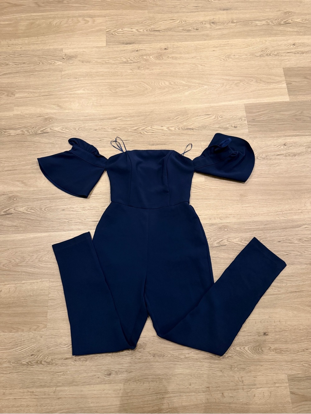 Adelyn Rae Navy Off-Shoulder Jumpsuit with Flared Sleeve Detail